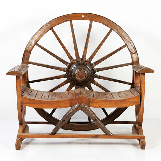 Wagon-wheel bench, est. $250-$300. Image courtesy Morton Kuehnert Auctioneers.